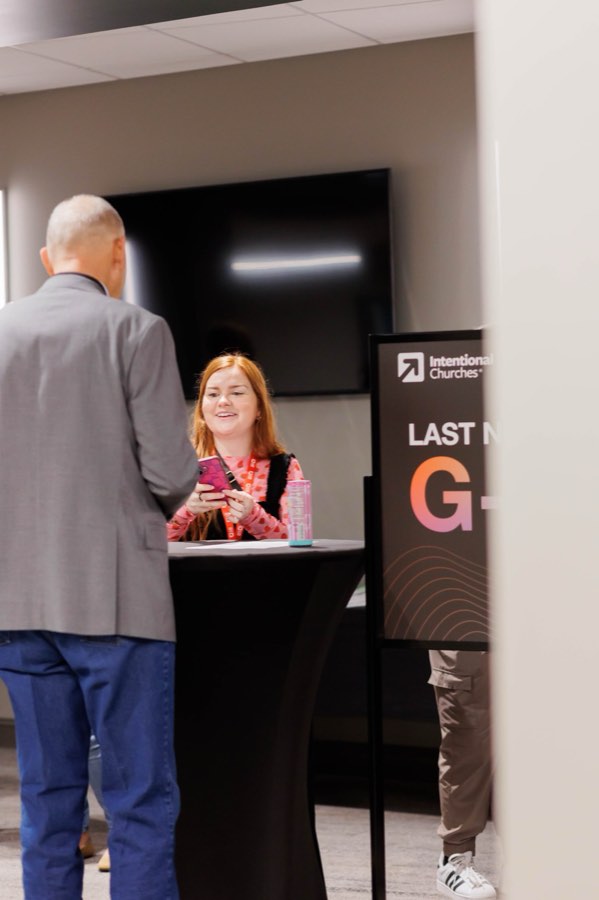 Attendee checking in at registration